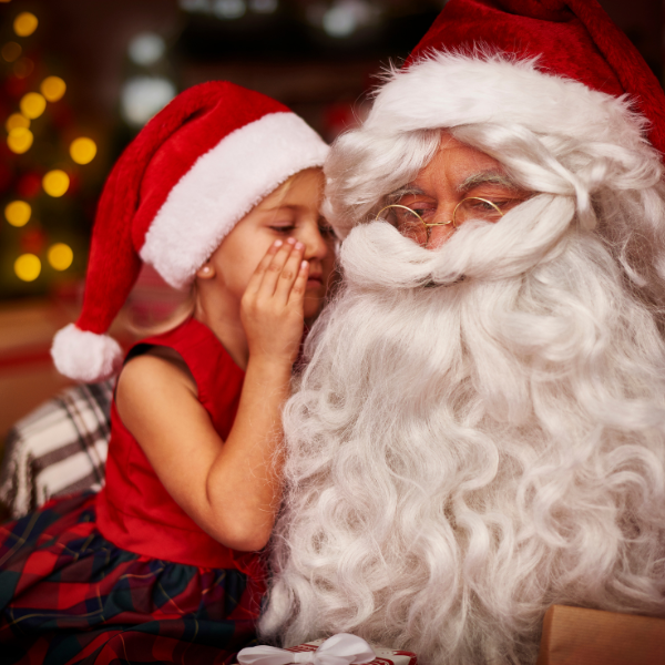 enfant qui parle durant une animation père noël en entreprise