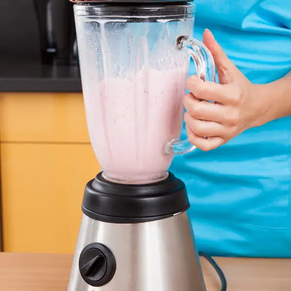 blend drinks during a milkshake bar event at a company