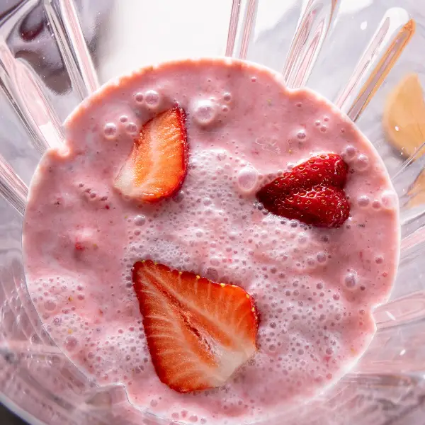 blended strawberries during a milkshake bar event at a company