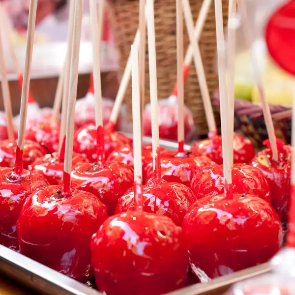 Photos of candy apples taken during a candy apple event at a company